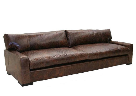 The Modern Leather Sofa is a classic statement piece designed to bring elegance and sophistication to any living room. Crafted with premium quality leather, this sofa features modern lines and an effortless style that will integrate seamlessly into any décor. Add timeless sophistication to your living room with this modern leather sofa.