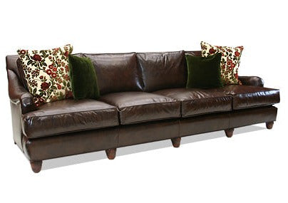 This 4 Seat Classic Leather Sofa is perfect for any living room. Its four-seat design provides plenty of space to relax, while the leather material offers maximum durability and a timeless look. Plus, it includes pillows for added comfort. Enjoy a quality piece of furniture that will last for years to come.
