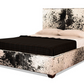 This king-sized bed is designed for luxury with a sophisticated western feel. Made with natural cowhide for superior warmth and comfort, it boasts an exquisite style that offers a unique luxurious look.