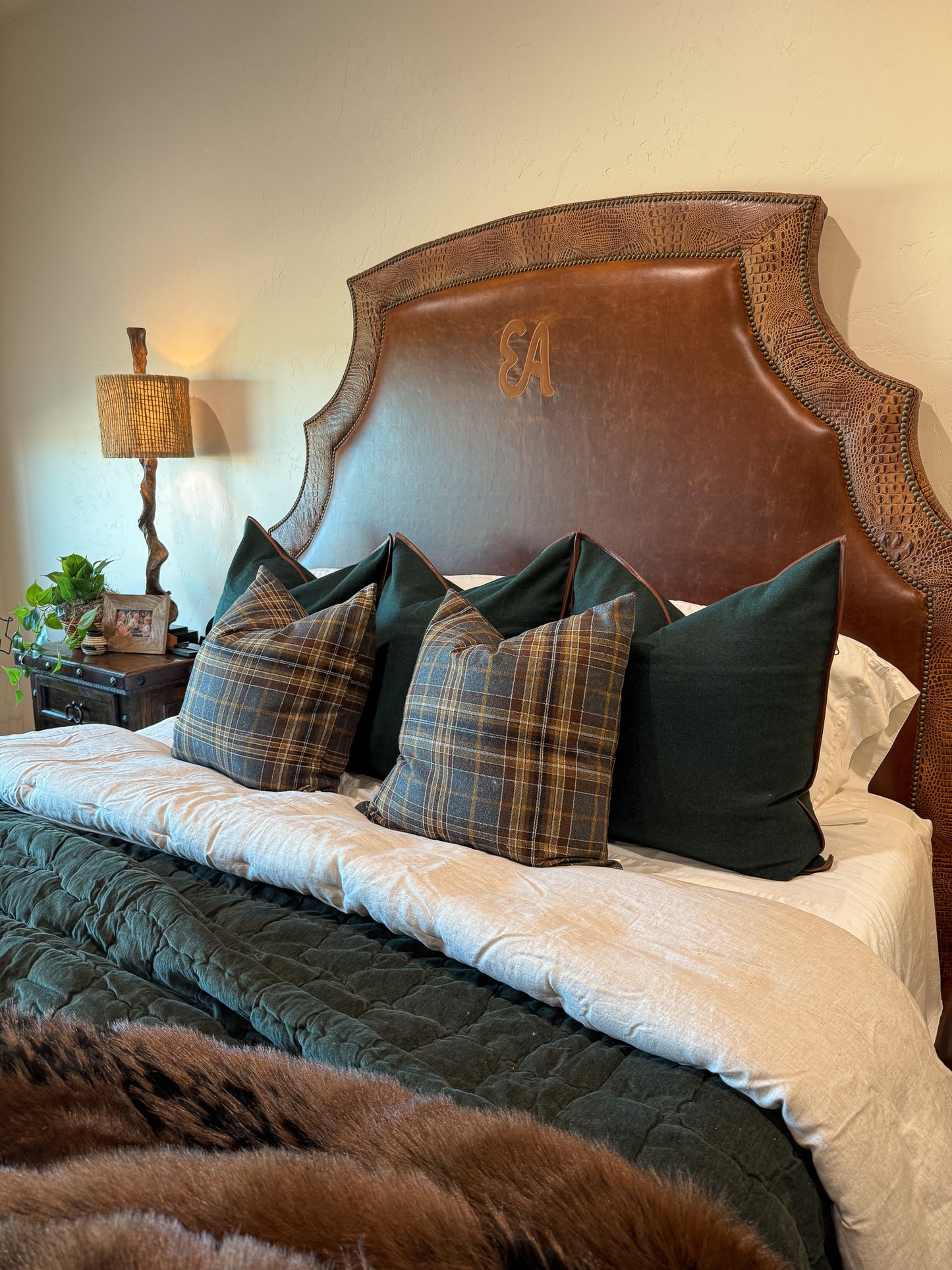 brown leather bed with alligator accents