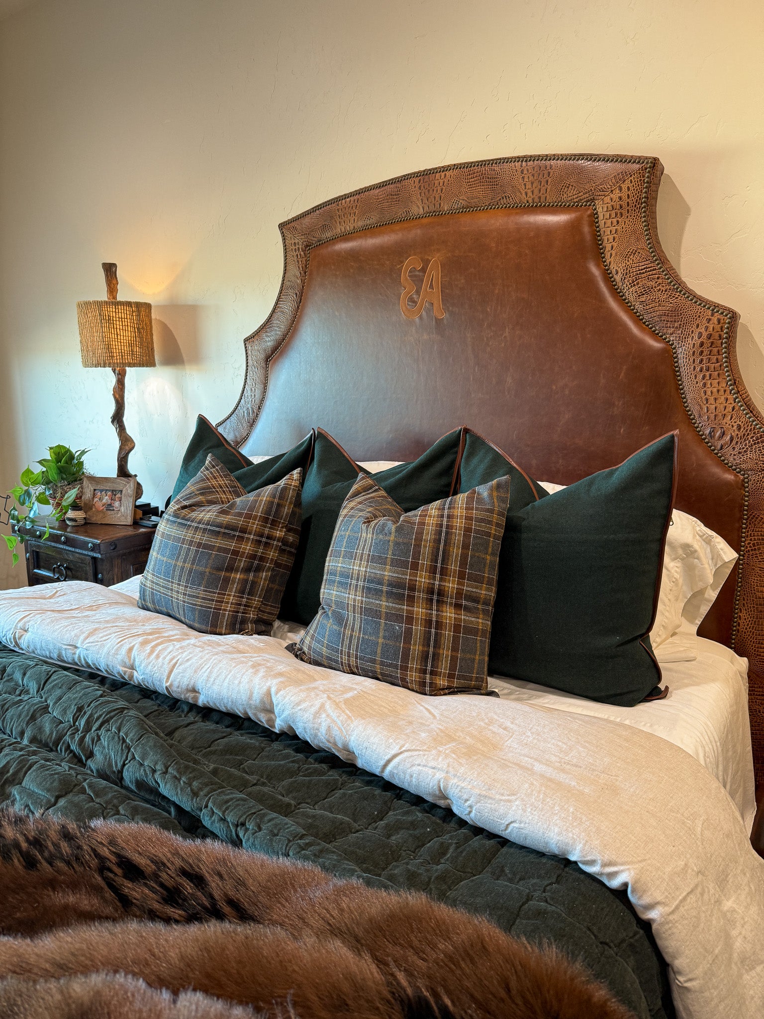 brown leather bed with alligator accents