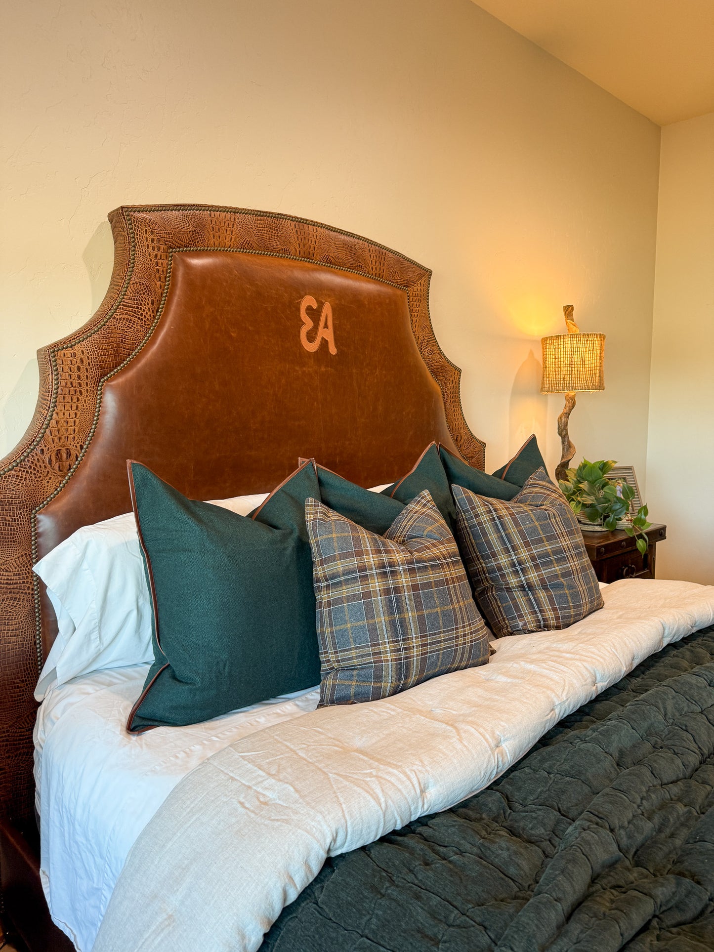 brown leather bed with alligator accents