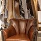 BROWN LEATHER SWIVEL CHAIR WITH CROC ACCENTS AND NAILS