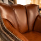 BROWN LEATHER SWIVEL CHAIR WITH CROC ACCENTS AND NAILS
