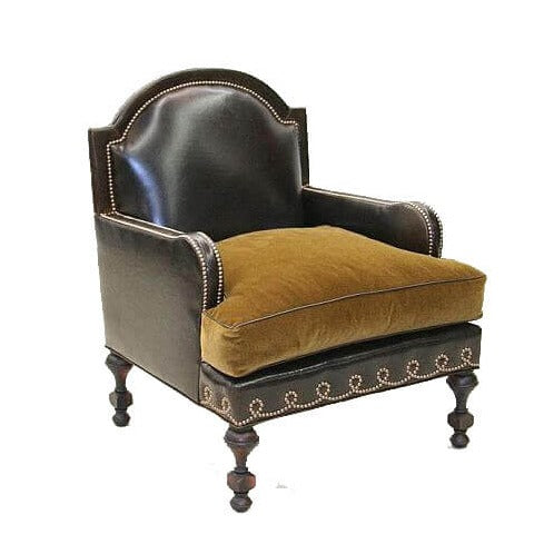 This armchair provides an elegant accent to any living room or office. Crafted from plush velvet upholstery and genuine leather, this piece features luxuriously detailed nailhead trim for a classic, sophisticated look. Enjoy timeless comfort and beauty with this exquisite armchair.