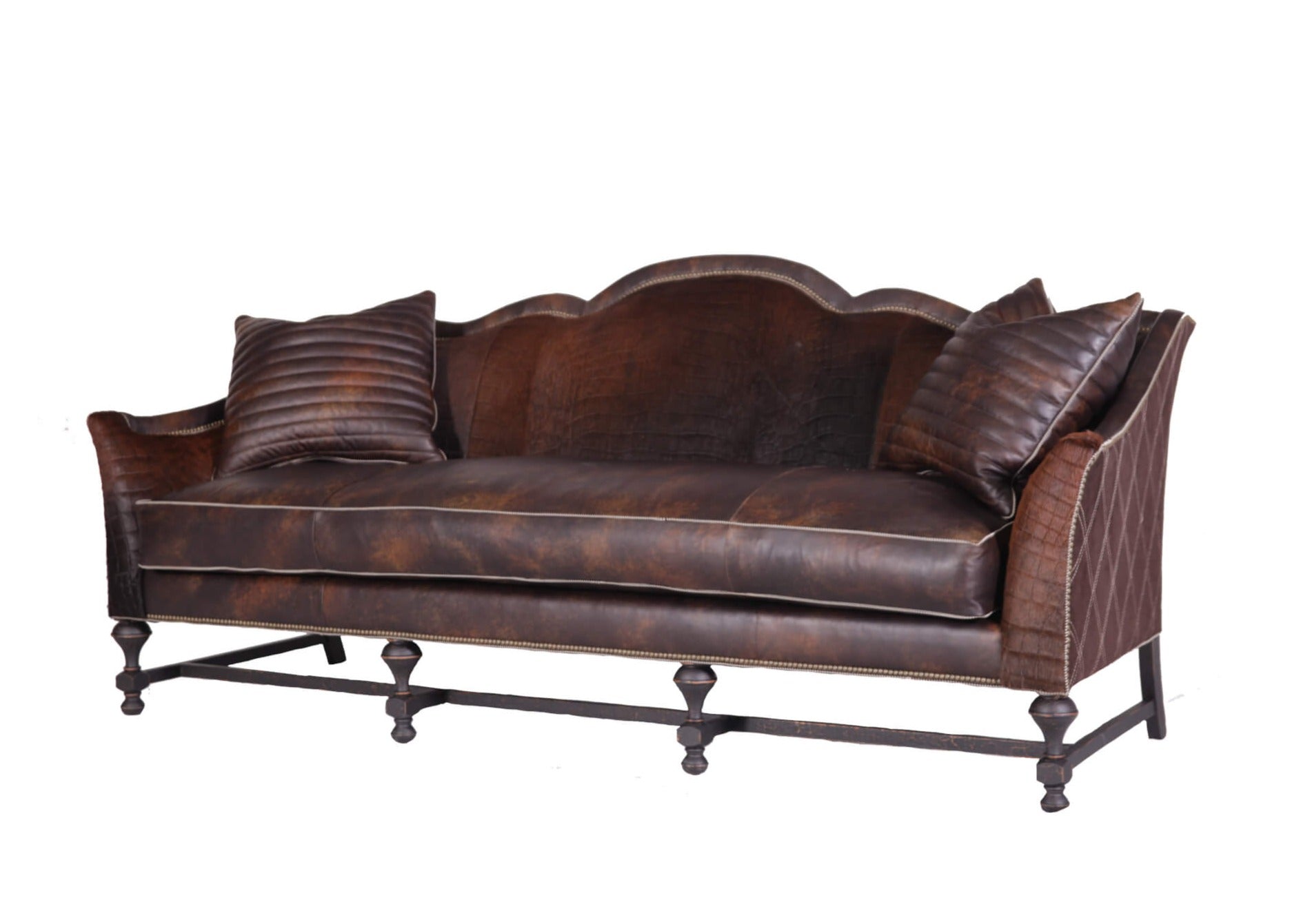 The French Country Sofa brings classic style to the living room. Featured in fabric upholstery or leather, plus stylish nailhead trim, it provides a luxurious, timeless look. Create a homey atmosphere and add a touch of elegance to your space.
